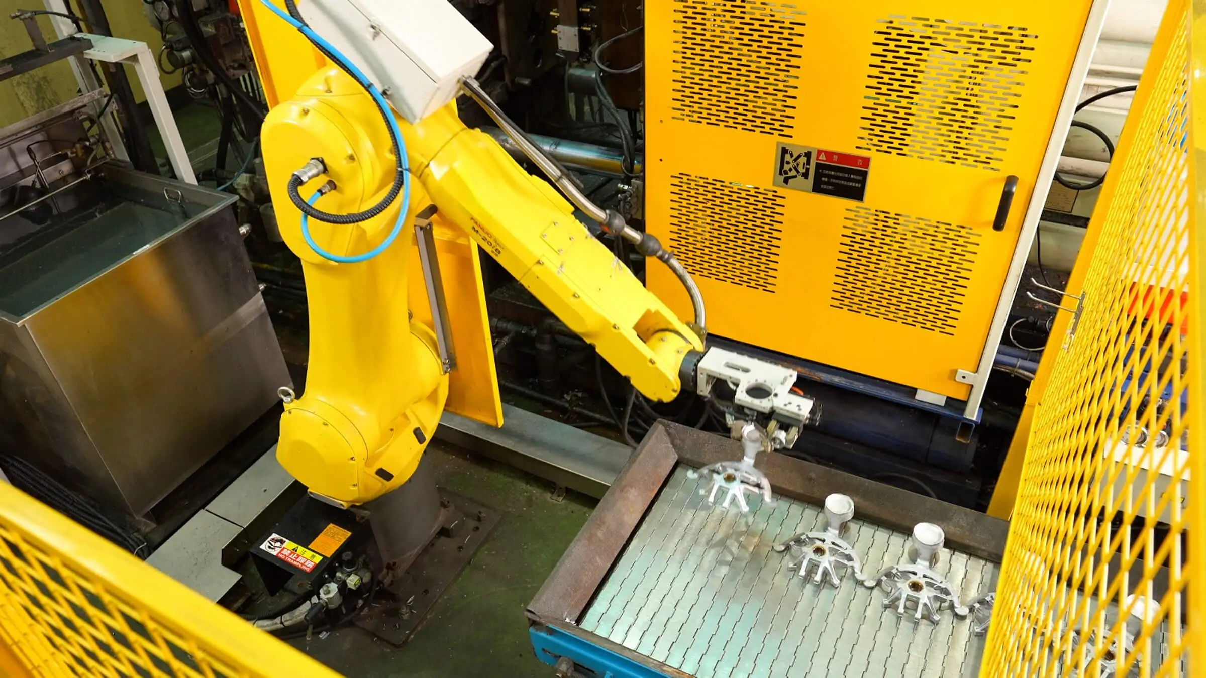 Fanucロボットアームを備えた高圧アルミ合金ダイカスト設備、自動取出しと安定したサイクルタイムを実現